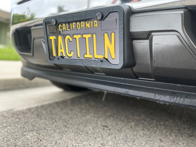 SILICONE TOPOGRAPHY LICENSE PLATE FRAME - ANTI-RATTLE, ANTI-SCRATCH